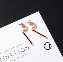 Load image into Gallery viewer, Japan and South Korea simple long tassel titanium steel earrings temperament triangle round geometric earrings
