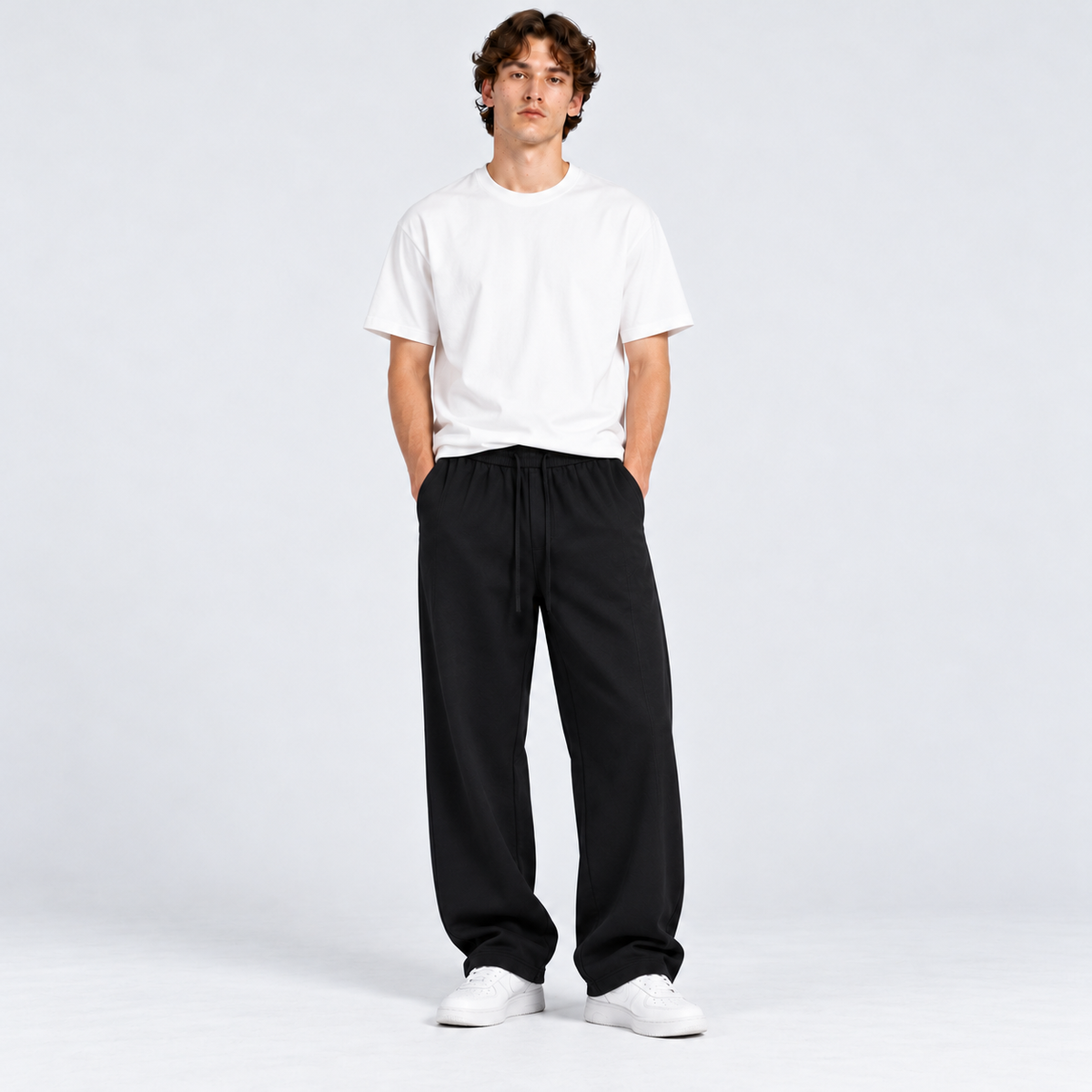 WALMYE Essential Wide-Leg Drawstring Pants in Black - studio product and styling view 1